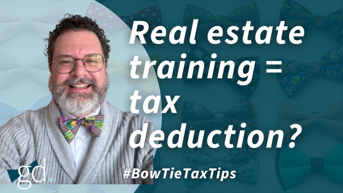 White male with dark curly hair and whitish beard, wearing glasses and an Easter patterned bow tiw, with a light gray sweater, talkinga bout Deducting real estate education expenses