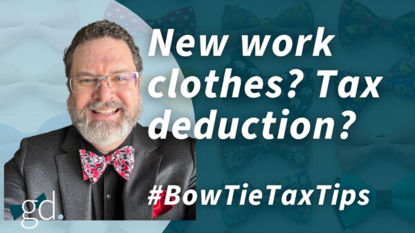 White male, dark curly hair, whitish beard, wearing glasses, a black suit jacket, black shirt and red paisley bow tie talking about "can you deduct your work clothes"