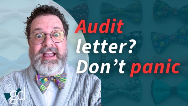 White male with white beard, glasses and a gray sweater and purple, yellow and green bow tie - talk about what happens if you have an audit letter from CRA